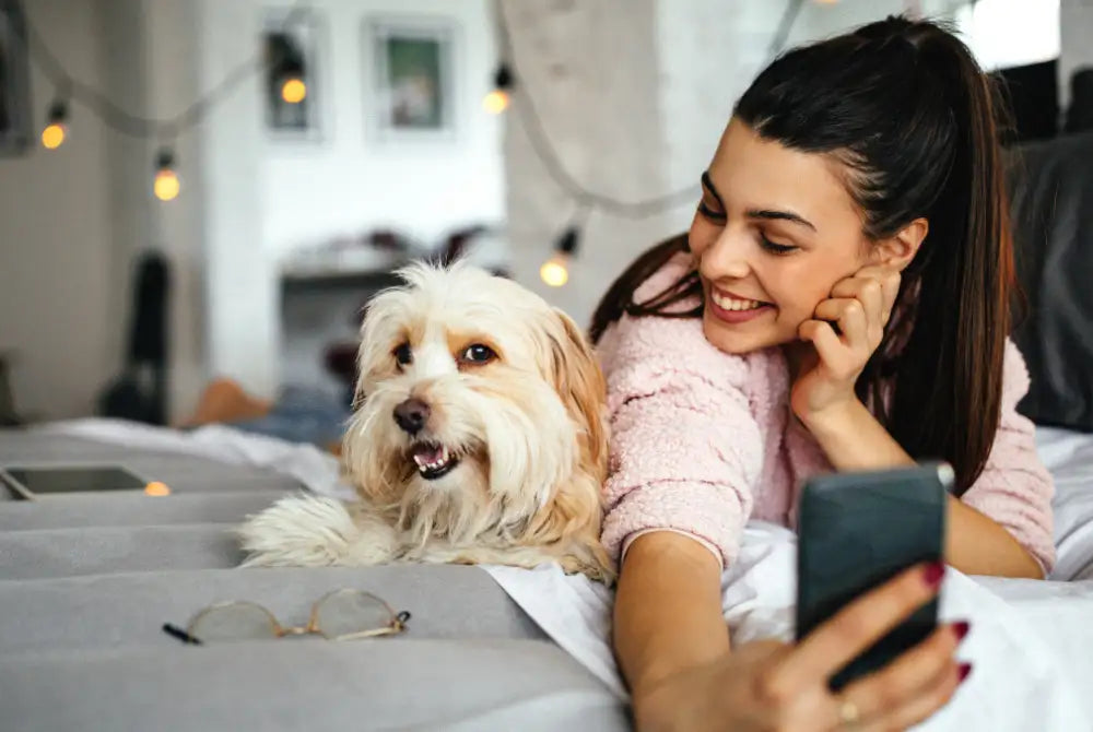 woman and dog taking a selfie